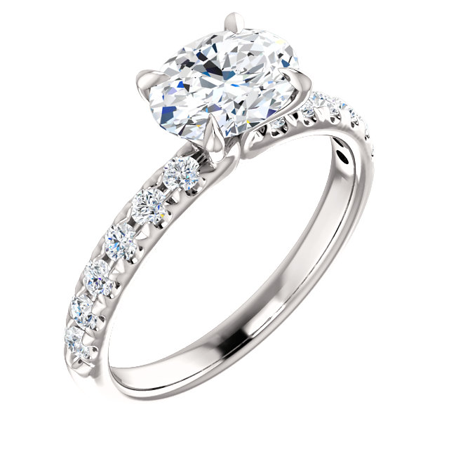 diamond ring featuring a square center diamond set in a four-prong setting